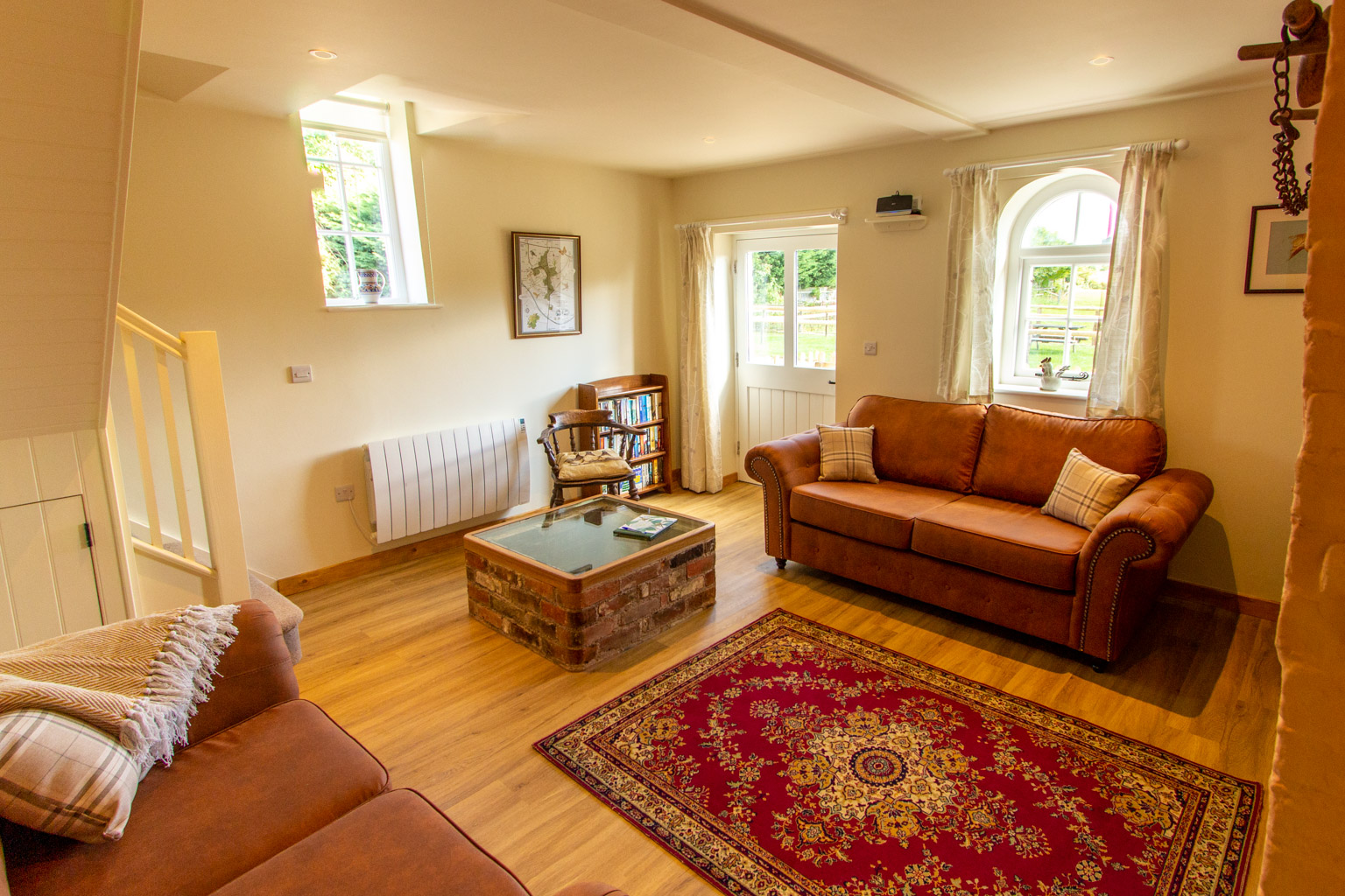 The warm and cosy living room, the perfect place to rest the feet after a long afternoon walk